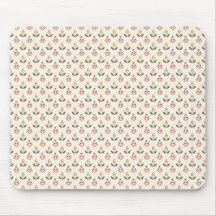 Beige mousepad with a repeating floral pattern