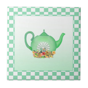 Bela chaleira verde com Azulejo cerâmico de flores