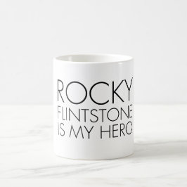 Belinda piscou a caneca de café