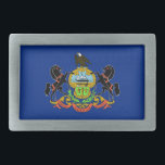 Belt Buckle com Bandeira do Estado da Pensilvânia<br><div class="desc">Adicione um toque vibrante do espírito da Pensilvânia ao seu traje com nossa fivela de cinto exclusiva com a bandeira da Pensilvânia! Criada com atenção meticulosa aos detalhes, esta fivela de cinto é mais do que funcional; é uma celebração do patrimônio da Pensilvânia e do orgulho estatal. O design ousado...</div>