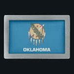Belt Buckle com Bandeira do Estado de Oklahoma<br><div class="desc">Adicione um toque vibrante do espírito de Oklahoma ao seu traje com nossa fivela de cinto exclusiva com a bandeira de Oklahoma! Feito com atenção meticulosa aos detalhes, esta fivela de cinto é mais do que apenas funcional; é uma celebração do patrimônio de Oklahoma e orgulho estatal. O design ousado...</div>