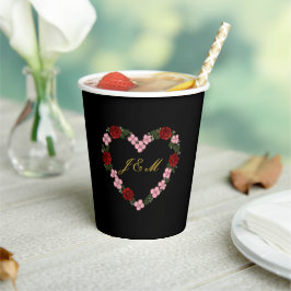 Black paper cup with a pink and red heart