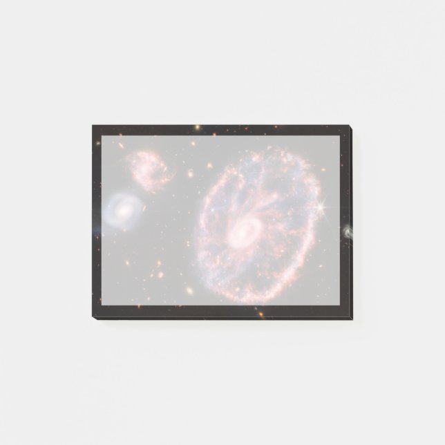 Bloco De Notas A Galáxia De Rodas De Cartaz E Suas Galáxias Compa (Frente)