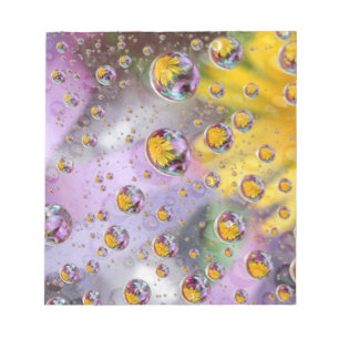 Bloco De Notas Bolhas abstratas com flores. Crédito: Nancy