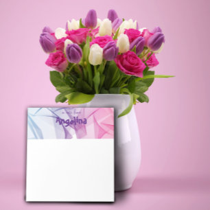 Bloco de notas com letra azul de abertura fucshia