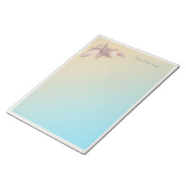 Bloco De Notas Conchas em uma praia