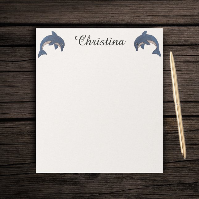 Bloco De Notas Duas Espontas Bonitas Como Golfinhos Saltando Azul (Two blue sparkling jumping dolphins on textured look white paper notepad.)