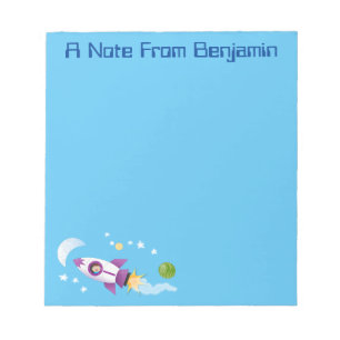 Bloco De Notas Imagem de um foguete em cartoon espacial