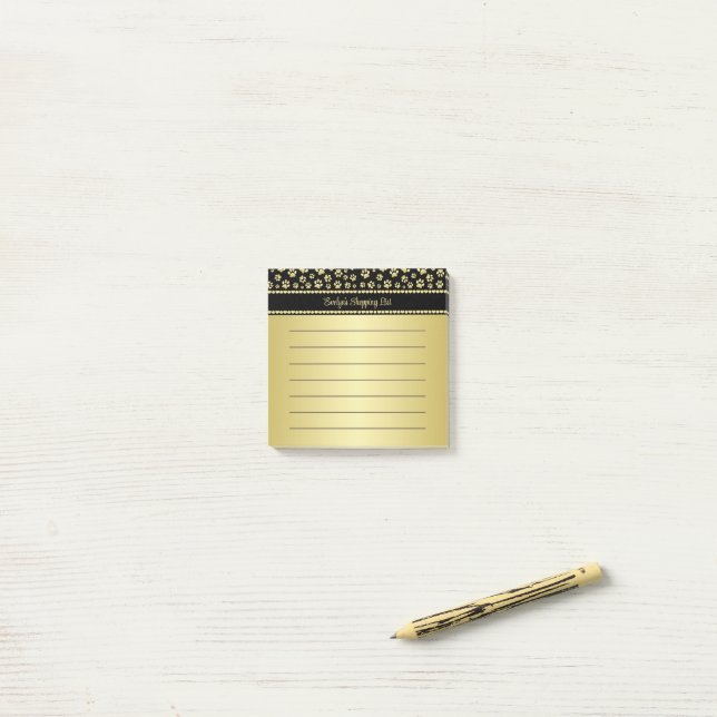 Bloco De Notas Impressões de Pata Douradas em Preto com Nome Pers (Na mesa)