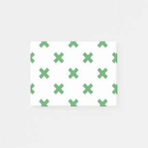 Bloco De Notas Pontos de cruz verdes sobre o branco