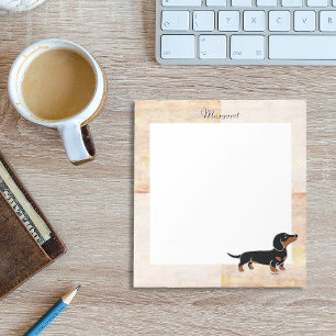 Bloco De Notas Preto e levantamento do Dachshund de Tan