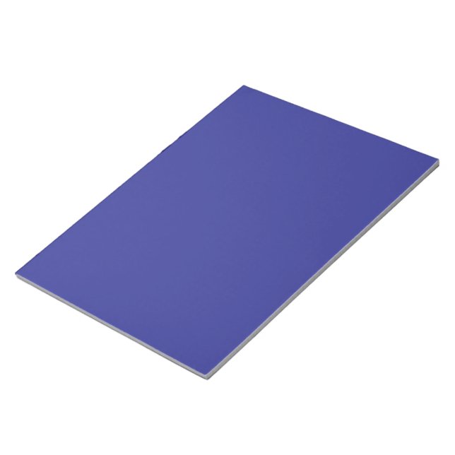 Bloco De Notas uma parede azul com um relógio nela (Inclinado)