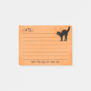 Bloco Post-it Gato preto na almofada de nota alaranjada feita