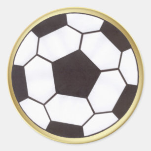 Bola de futebol com adesivo de acabamento dourado