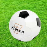 Bola De Futebol Numero do nome das iniciais do monograma preto bra<br><div class="desc">Um fundo branco na moda e um texto preto,  branco e ouro. Personalize e adicione seu nome e número de jogador.</div>