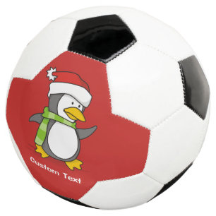 Bola De Futebol Pinguim de Natal andando na neve