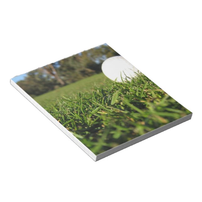 Bola de Golf no Bloco de Notas do Curso (Inclinado)