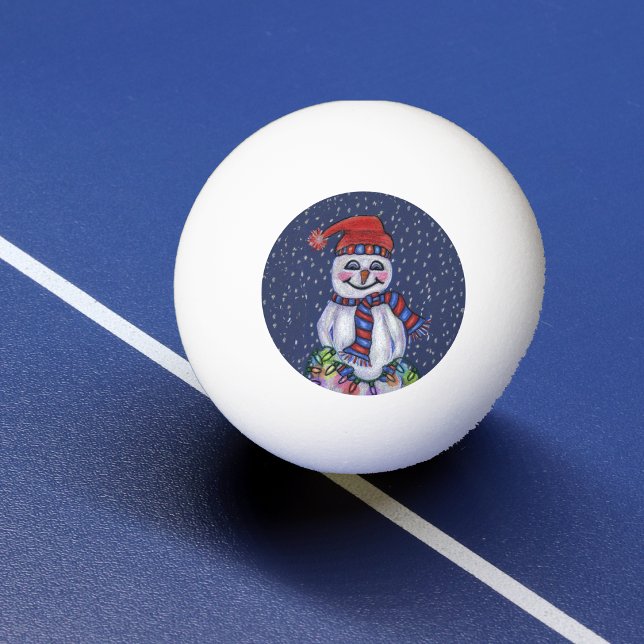 Bolinha De Ping Pong Luzes de Natal Boneco de Neve Sorridente Flocos de (Smiling snowman in hat scarf holding bright string Christmas lights falling snow on ping pong ball.)