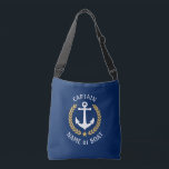Bolsa Ajustável Capitão Seu Nome De Barco Ancora Dourado Marinho L<br><div class="desc">Um saco de tote de corpo cruzado com na moda com Capitão ou outro título, seu nome personalizado, nome do barco ou outro texto desejado. Possui uma âncora náutica personalizada, projetada com folhas laurel em estilo ouro e estrela em azul marinho. Personalize facilmente a cor base para corresponder ao seu...</div>