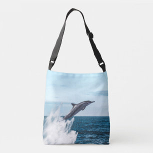 Bolsa Ajustável Golfinho saltando para fora do oceano