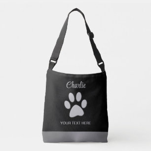 Bolsa Ajustável Pata de Cachorro de Prata sobre fundo preto