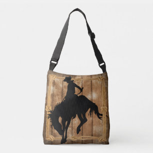 Bolsa Ajustável Silhouette Cowboy em um Cavalo do Bronco