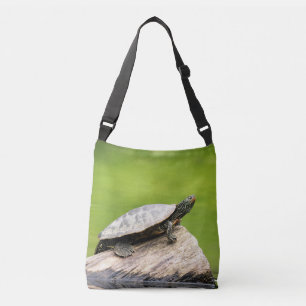 Bolsa Ajustável Tartaruga pintada em um tronco