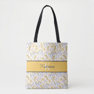 Bolsa de mão com flores monogramadas