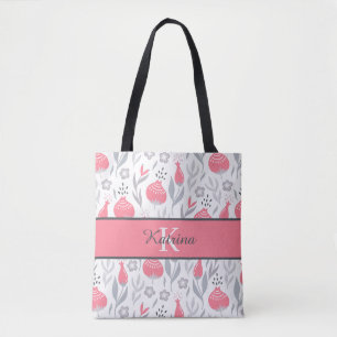 Bolsa de mão com flores monogramadas