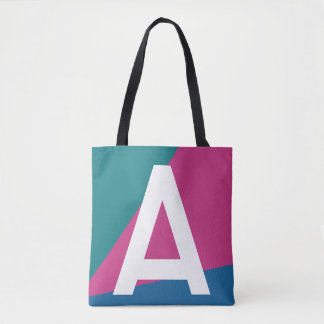Bolsa de mão com monograma e bloco de cores retrô