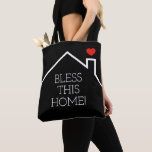 Bolsa Tote Abençoe esta casa<br><div class="desc">Um coração vermelho sobre o telhado de uma casa com as palavras "Abençoado Esta Casa!" aparece na frente e atrás desta bolsa de tote. MUDE A COR DE FUNDO para qualquer coisa - mostramos preto.</div>
