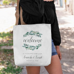 Bolsa Tote Abundant Foliage Wedding Welcome<br><div class="desc">Bem-vindos convidados para o seu casamento com estes bolsas botânicos com "boas-vindas" em escrita de caligrafia rodeada por verduras botânicas exuberantes e folhas de eucalipto. "... para a nossa alegria para sempre" aparece abaixo com seus nomes e data de casamento.</div>