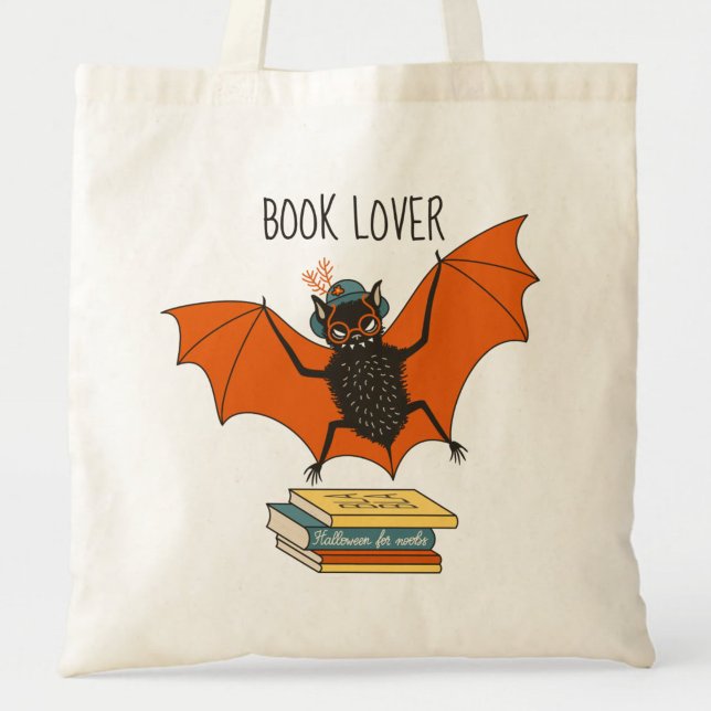 Bolsa Tote Bat Granny Book Lover (close up of a canvas tote bag with flying funny cartoon bat librarian and the text book lover)