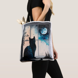 BOLSA TOTE BELA COR DE ÁGUA PRETA SENTADA NUMA JANELA