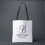 Bolsa Tote Bridesmaid Personalizada Elegante Preta e Branca<br><div class="desc">Donativos Personalizados Elegantes de Bridesmaid Pretos e Brancos com um monograma personalizado em estilo de letra elegante com nome e título da madrinha em estilo de letra de serifa clássico. Também perfeito para Madrinha de casamento,  Flor Girl,  Mãe da Noiva e muito mais.</div>