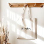 Bolsa Tote Caligrafia mínima por script Ivory Cream Moderna<br><div class="desc">Elevem seu carregar diário com nosso Saco de Tote de Manuscrito Minimalista Preto e Creme. O design de chic oferece amplo espaço livre para anotações manuscritas ou toques pessoais, enquanto a elegante caligrafia escrita adiciona um talento sofisticado. Este bolsa é a combinação perfeita de estilo e funcionalidade, fazer que ele...</div>