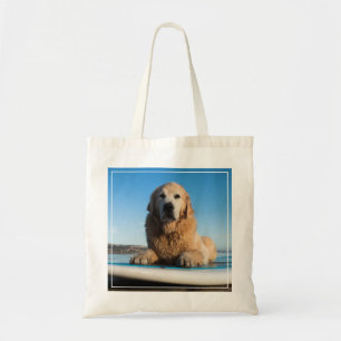 Bolsa Tote Cão do golden retriever que coloca em um conselho