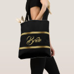 Bolsa Tote Casamento nojento de ouro negro elgant bold<br><div class="desc">Duas fitas falsas de ouro,  com a palavra: noiva em um script de estilo manuscrito,  letras de ouro. Cor de fundo preto elegante e eterno.</div>