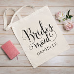 Bolsa Tote Casamento Personalizado de Script Negro de Bridesm<br><div class="desc">A bolsa de tote Bridesmaid de casamento apresenta um script de caligrafia preto moderno escrevendo com elegante texto personalizado de nome próprio que você pode personalizar. Veja nossos designs de festas de noiva coordenadora!</div>