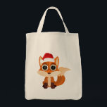 Bolsa Tote Cute Christmas Fox Cartoon Holiday Animal Festive<br><div class="desc">Carry holiday joy on every shopping trip 🦊🎄 This adorable cartoon fox, with big expressive eyes and a cozy Santa hat, brings cute kawaii vibes, festive charm, and winter aesthetics to your everyday errands. Perfect for groceries, holiday shopping, or as a fun and practical gift, this tote spreads joy wherever...</div>