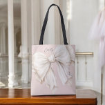 Bolsa Tote Cute Girly Ivory White Bow on Pink<br><div class="desc">Cute and feminine,  this tote bag design has a large watercolor ivory white bow on a soft blush pink background. The bow is angled to one side adding a touch of charm. A text template is included to personalize with your name.</div>