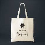 Bolsa Tote Dama de Honra Minimalista com Laço Preto Script<br><div class="desc">A Bolsa Minimalista Coquete com Laço Preto Script Dama de Honra adiciona um toque de elegância ao seu grupo de noivas. Com um laço delicado e script elegante,  é perfeita para carregar os itens essenciais enquanto celebra o seu dia especial.</div>