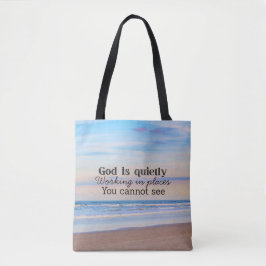 Bolsa Tote Deus está trabalhando tipografia cristã Bíblico