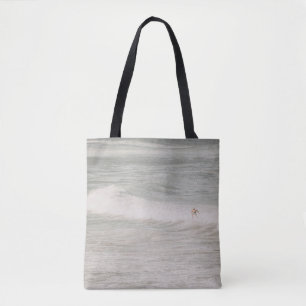 BOLSA TOTE DUAS PESSOAS A SOBREVIVER EM ONDAS MARÍTIMAS DURAN