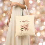Bolsa Tote Elegant blush floral script cherry blossom wedding<br><div class="desc">Romantic blush pink blossoms and flowing script lettering create a soft, elegant name design perfect for bridesmaids and wedding party totes. This delicate floral artwork on a warm neutral background suits spring or summer celebrations and adds a feminine touch to any outfit. Simply add your chosen name to create a...</div>