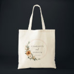 Bolsa Tote Elegant Copper & Earthy Botanical Wedding<br><div class="desc">Elegant Copper & Earthy Botanical Wedding Tote Bag with your names & date. Immerse yourselves in natural elegance with our Copper & Earthy Botanical Wedding napkins with your names & date. This sophisticated design captures the warmth and charm of a Boho-inspired wedding, featuring stunning copper and burnt orange florals beautifully...</div>