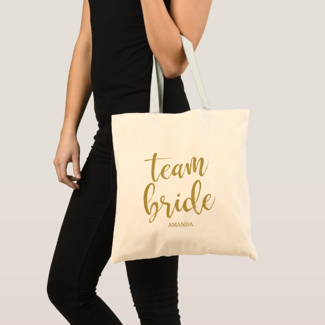 Bolsa Tote Equipe Bride Dourada Litter Bridesmaid Bachelorett (Frente (produto))