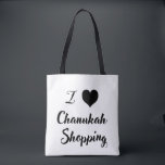 Bolsa Tote Eu 🖤 Chanukah. Comprar<br><div class="desc">Tragam diversão e capricho para suas férias com nosso festivo 🖤 Chanukah comprando bolsa! Apresentando um design de tipografia ousado com cores negras e brancas contrastantes. este bolsa ecológico é perfeito para presentes de carregando, mercearias, e mais enquanto espalha a alegria de Chanukah" Durável, espaçoso e na moda, é o...</div>