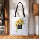 Bolsa Tote Girassóis e pontos quíticos russos com monograma<br><div class="desc">Personalize esta bolsa com o seu monograma ou outro texto desejado. Um buquê brilhante e alegre de girassóis amarelos colorido de água em cascata sobre um quadrado preto contrastante que rodeia seu monograma. O fundo é um pequeno padrão de bolinhas. Este bolsa prático faz um belo presente personalizado para amigos,...</div>