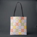 Bolsa Tote HOGWARTS™ QUIDDITCH™ Team Checker Pattern<br><div class="desc">Celebrate the magic of the wizarding world with this charming checkered icon pattern design. Featuring a playful patchwork of house-inspired colors, broomsticks, magical balls, crests, and other wizarding symbols, this all-over print blends classic charm with whimsical detail. The alternating checkerboard layout gives the design a cozy, quilt-like feel, while the...</div>